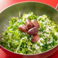 Prasini Salad · Chopped Romaine Lettuce, Scallions, Dill, Kalamata Olives, & Imported Greek Feta topped with...