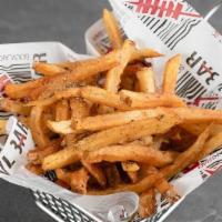 Hand-Cut Fries · Fresh hand-cut fries topped with fresh-crushed oregano and sea salt.