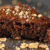 Walnut Cake (Karidopita) · A moist flavorful walnut cake that is flavored with cinnamon and bathed in sweet syrup.