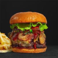 Baby Bbq Burger · American beef patty topped with melted cheese, barbecue sauce, lettuce, tomato, onion, and p...