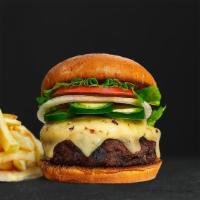 Spice Star Burger · American beef patty topped with melted cheese, jalapenos, lettuce, tomato, onion, and pickle...