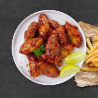 Bee'S Bbq Wings · Fresh chicken wings breaded, fried until golden brown, and tossed in honey and barbecue sauc...