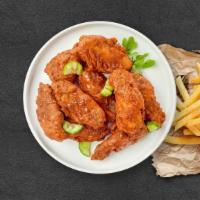 Take The Heat Wings · Fresh chicken wings breaded, fried until golden brown, and tossed in Nashville Hot Sauce. Se...