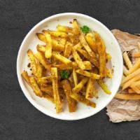 Genius Garlic Fries · (Vegetarian) Idaho potato fries cooked until golden brown and tossed with chopped garlic.