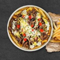 Illy Philly Fries · Steak, caramelized onions, bell peppers, and melted cheese topped on Idaho potato fries.