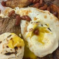 Mountain Plate · Beef, rice, beans, fried egg, sweet plantain, and fried pork skin.