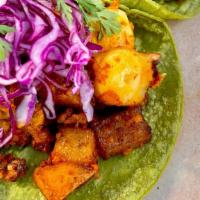 Tacos De Pulpo Y Chorizo · Sauteed octopus with Mexican chorizo and potatoes on a special green cactus corn tortilla, t...