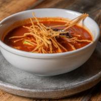 Sopa Azteca · Traditional Mexican chicken tortilla soup, chile guajillo, chile ancho, with queso fresco, c...