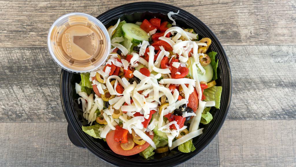 House Salad · Romaine lettuce, tomato, cucumber, black and green olives, roasted peppers, and mozzarella.