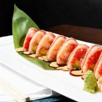 Pink Lady · Crunchy spicy tuna, avocado, and shrimp tempura wrapped in pink soypaper.