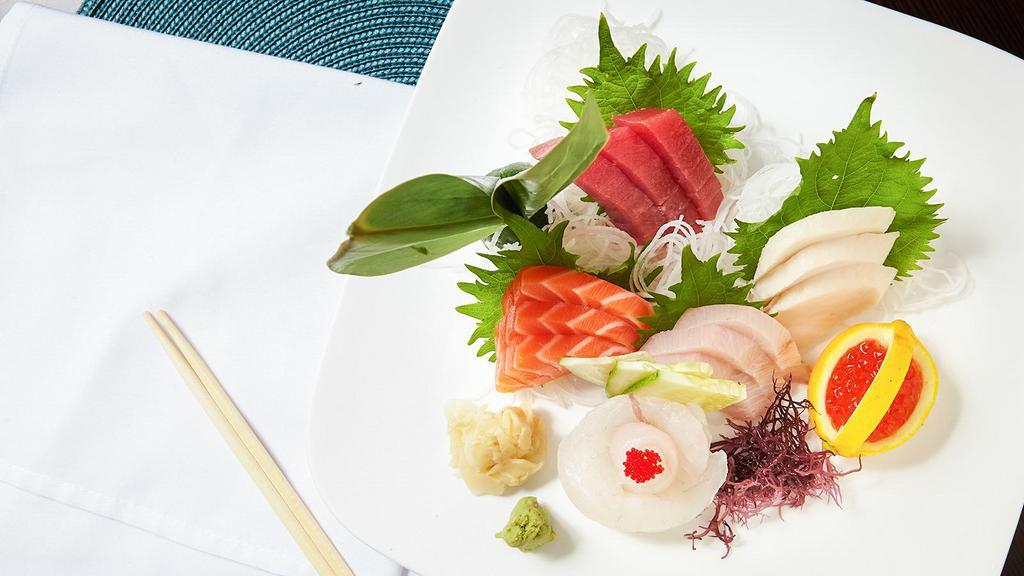 16 Piece Sashimi Deluxe · Served with miso soup or salad.