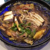 Sukiyaki Noodle Soup · Thinly sliced chicken or beef, vegetables, and tofu cooked with yam noodles in sukiyaki broth.