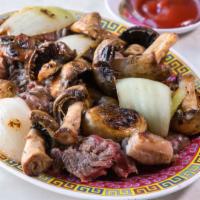 *Ribeye Steak With Onions · Popular / specialty item.
