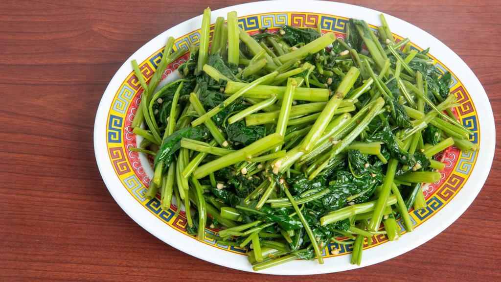 Stir-Fried Ong Choy · Add Cake Noodle for an additional extra charge.