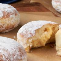 King Cream Donut · Soft Donut, Bavarian Cream, Powdered Sugar.

Contains: Egg, Milk, Soy, Wheat