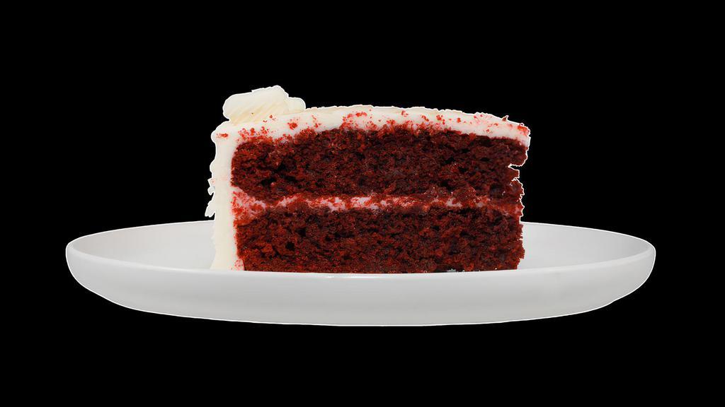 Red Velvet Cake · Double layer of red velvet cake surrounded and topped with a real cream cheese icing