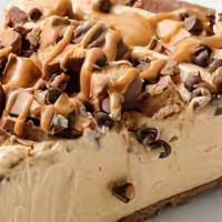 High Peanut Butter Pie · Creamy peanut butter mousse and silky milk chocolate fill chocolate cookie crust and are top...