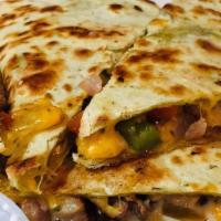 Steak Quesadilla · Mixed peppers, onions, cheddar and mozzarella cheese.