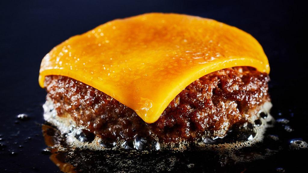 Beef Patty With Cheese · Delicious beef patty with melted cheese.