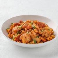Jambalaya Mac  · Sauteed shrimp, grilled chicken, andouille sausage, tomatoes, pepper and onions, tossed with...