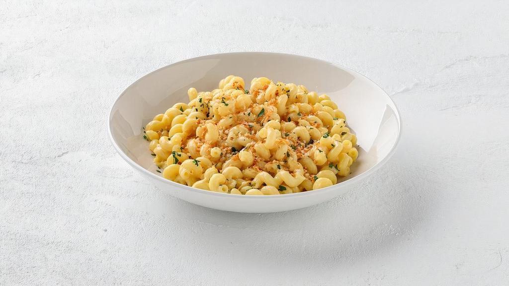 Killer Mac · The cheesiest, tastiest ever – a killer blend of smoked cheddar, pepper jack, Asiago and Parmesan cheeses, tossed with corkscrew-shaped cavatappi noodles and topped with roasted garlic bread crumbs.