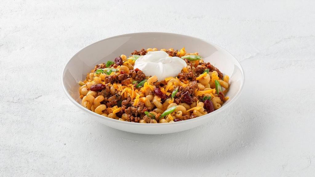 Chili Mac  · Our Killer Mac & Cheese and meaty beef chili, topped with grated cheddar, sour cream and green onions.