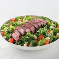 Sirloin Salad · Sliced grilled sirloin over mixed greens, bleu cheese and tomatoes, balsamic vinaigrette. Dr...