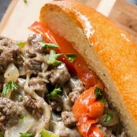Philly Cheese Steak · Yellow American Cheese, Cooked Onion, & Green Pepper.