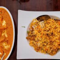 Butter Chicken · Boneless chicken roasted and immersed into a buttery tomato curry. Gluten free and halal.
