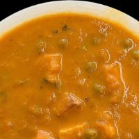 Matar Paneer · Indian cheese, peas, and onions cooked in a savory sauce. Gluten free.