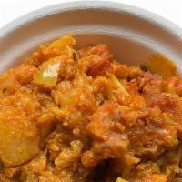 Aloo Gobhi · Tender cauliflower and potatoes sautéed with tomatoes and onions. Vegan and gluten free.