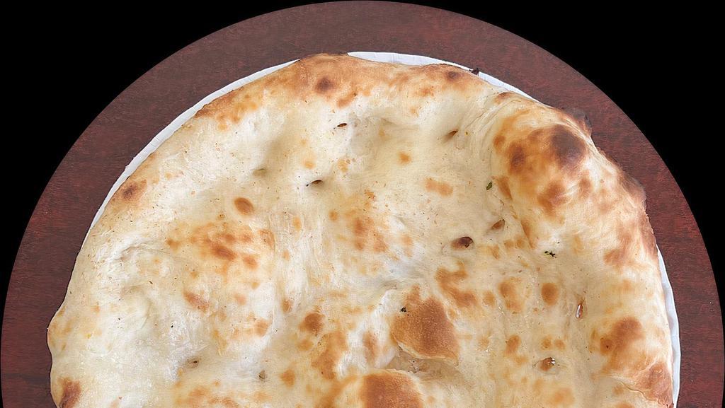 Naan · Bread baked in a clay oven. Vegan.