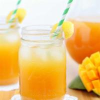 Mango Green Tea · Refreshing Green Tea with natural mango flavors. 
Served with mix jelly.