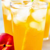 Passion Fruit Peach Tea · Refreshing Green Tea with natural peach and passion fruit flavors. 
Served with mix jelly.