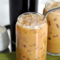 Iced Coffee · Iced coffee in Medium 16 oz size, your choice of cream and sugar or black.