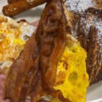 French Toast Deluxe · With bacon, ham and sausage.
