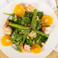 Bacio Salad · Spinach, shaved asparagus, fresh oranges, roasted almonds and grilled shrimps, in a raspberr...