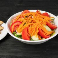 Small Garden Salad · mixed iceberg and romaine lettuce, ripe tomatoes, cucumbers and shredded carrots served with...