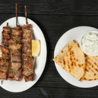 Pork Souvlaki Stick · served with 1 pita bread (does not include any sauce. Must order separately if desired)