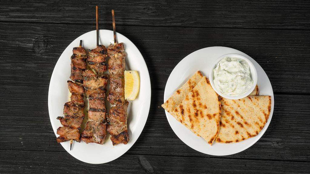 Pork Souvlaki Stick · served with 1 pita bread (does not include any sauce. Must order separately if desired)