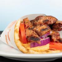 Sausage Pita · served with tomatoes, red onions and tzatziki all wrapped inside a toasted regular pita