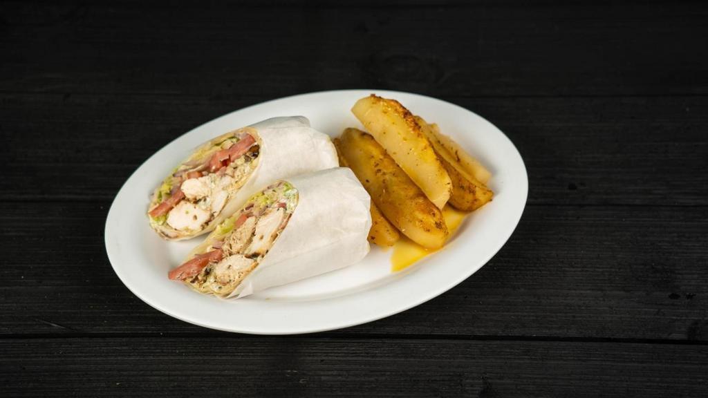 Chicken Or Pork Souvlaki Wrap · Chicken or Pork Souvlaki, tomatoes, red onions and tzatziki in your choice of wrap.