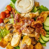 Chicken Blt Caesar Salad · Grilled chicken, crispy bacon, fresh greens, grape tomatoes, cucumber, red onion, house made...