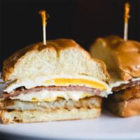 Jersey Belly Buster · 2 egg sandwich with crispy hash brown, American cheese, case's pork roll.