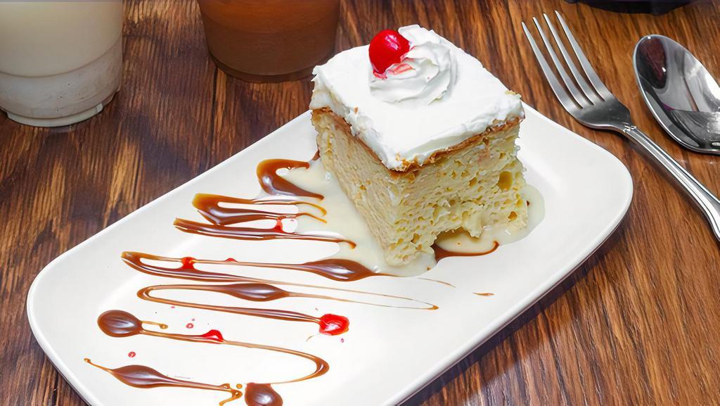 Tres Leches · Mexican Sponge Cake , Made with three different sweet creamy milks and topped with a cloud of vanilla whipped cream and dulce de leche.