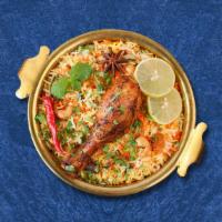 Chicken Bayside Biryani · Marinated chicken and saffron-flavored basmati rice with herbs and spices, garnished with ra...