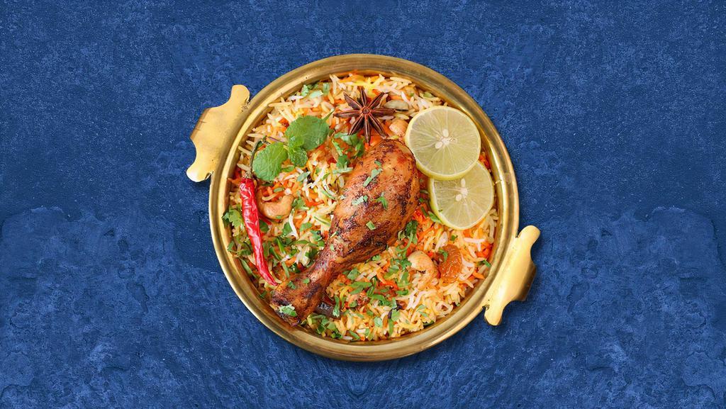 Chicken Bayside Biryani · Marinated chicken and saffron-flavored basmati rice with herbs and spices, garnished with raisins and cashews