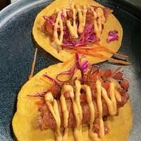 Tacos De Pescado · Tilapia Baja style, chipotle mayo, coleslaw, morita salsa, pico de gallo