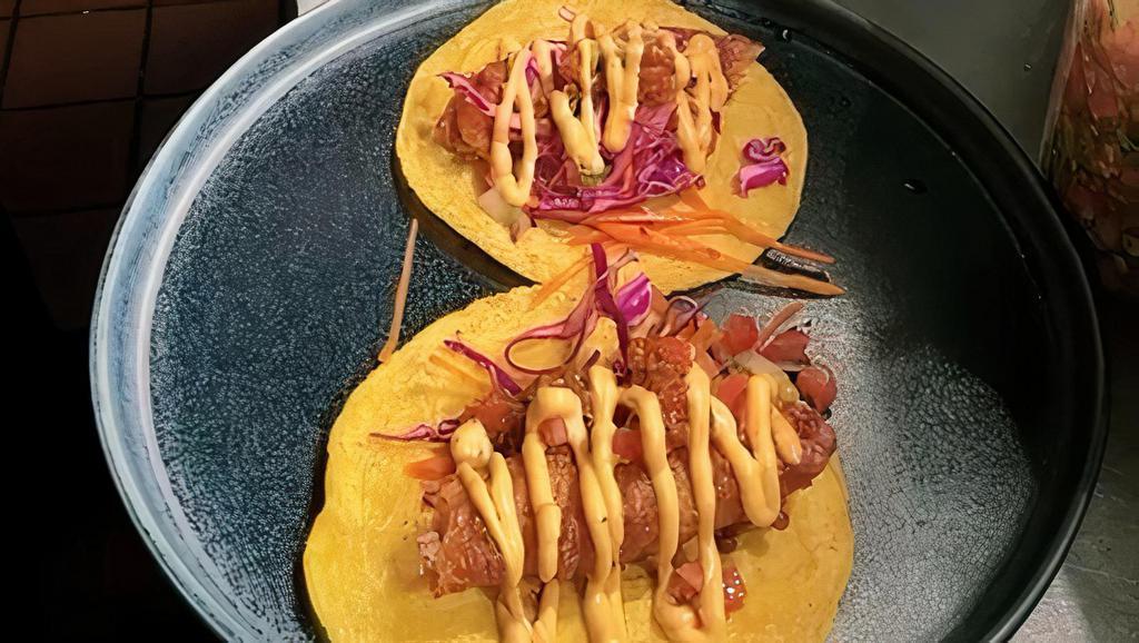 Tacos De Pescado · Tilapia Baja style, chipotle mayo, coleslaw, morita salsa, pico de gallo