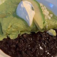 Enchiladas Verdes · Braised chicken breast, mole verde, avocado, sour cream, queso fresco and black beans